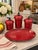 A striking four-piece collection from Southern Living’s “Cinnabar” collection, featuring a rich, glossy cinnabar-red...