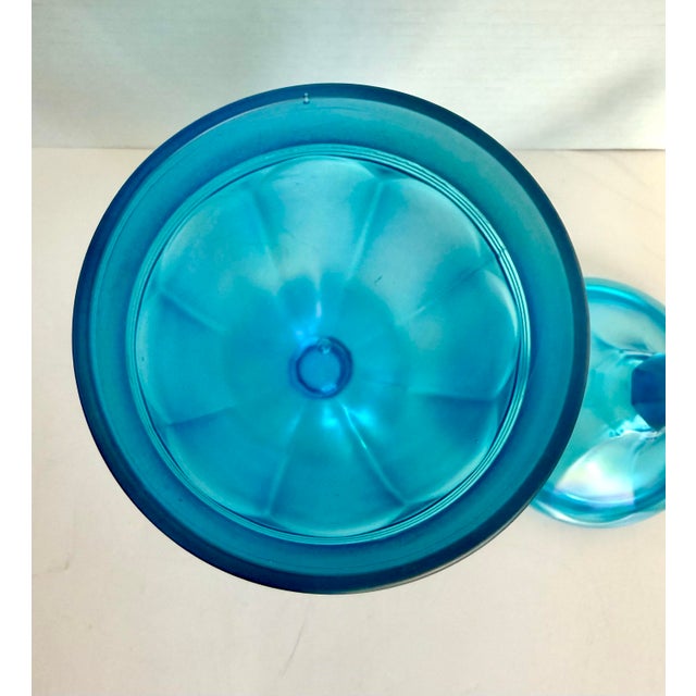 This vibrant vintage iridescent pressed glass lidded jar likely dates to the 1970s–1980s and features a classic pedestal...