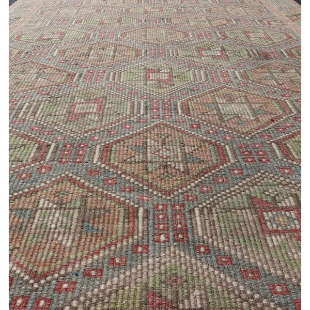 Colorful vintage Turkish flat-weave Tribal Motif Kilim with Embroideries. Keivan Woven Arts / rug /EN-178922 Mid-20th...