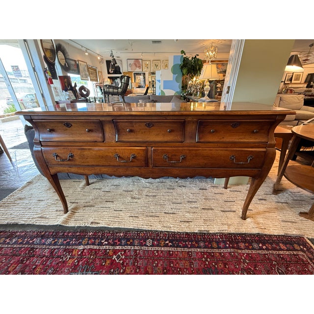 Design Plus Gallery presents a Sideboard from the Registry Collection for Henredon. The sideboard is in the Louis XVI...