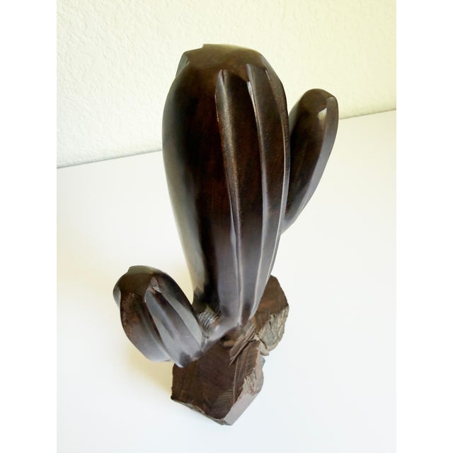 Large ironwood cactus hand-carved in Mexico, circa 1970s. Beautiful deep brown tone, wood figuring, and carving details....