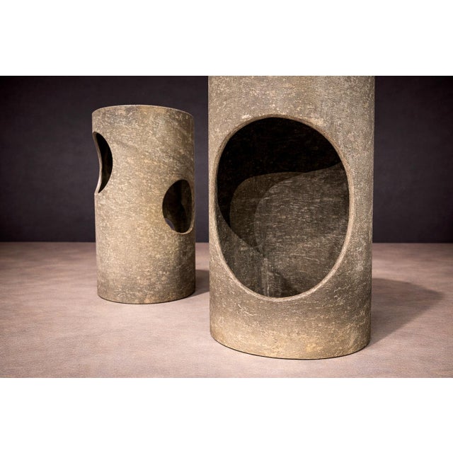 Attributed to an unknown designer and produced in the 1960s, this set of three fiberglass stools reflects a period of...