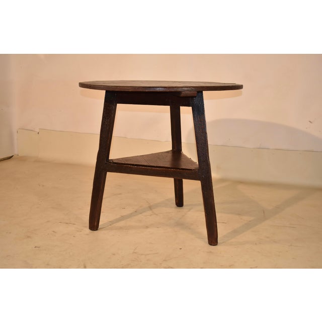 Late 18th century/early 19th century pine cricket table from England. The table has what appears to be the original...