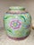 This is a decorative lidded porcelain ginger jar or tea caddy in a Chinese-inspired style. It has a soft celadon-blue...