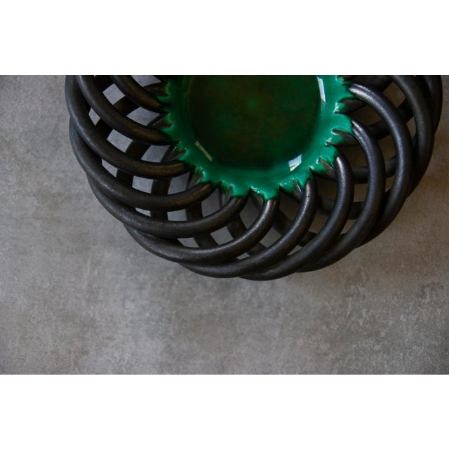 A woven ceramic bowl from Vallauris by Clement and Jerome Massier. Marked by les Fréres Massier on the bottom.