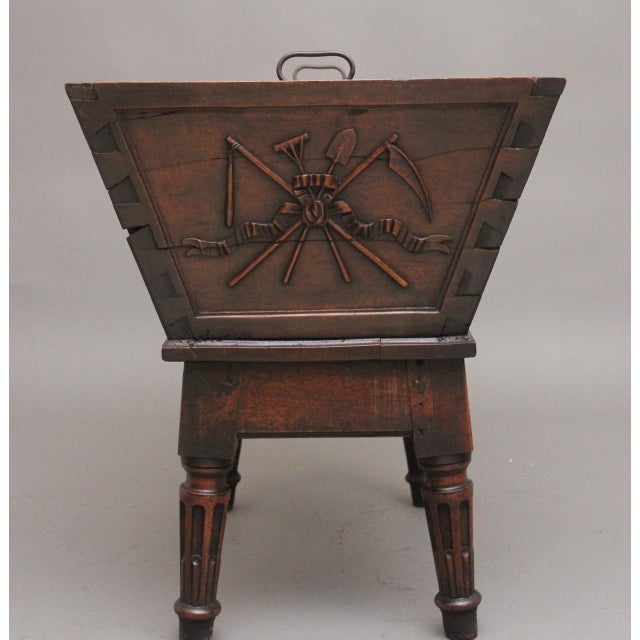 18th Century French walnut wine cooler / planter, the shaped structure having intricate carving around all sides...