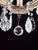 Beautiful theresian-type chandelier. Polished brass body. Hand-cut crystal trimmings. The chandelier has 8 arms + one...