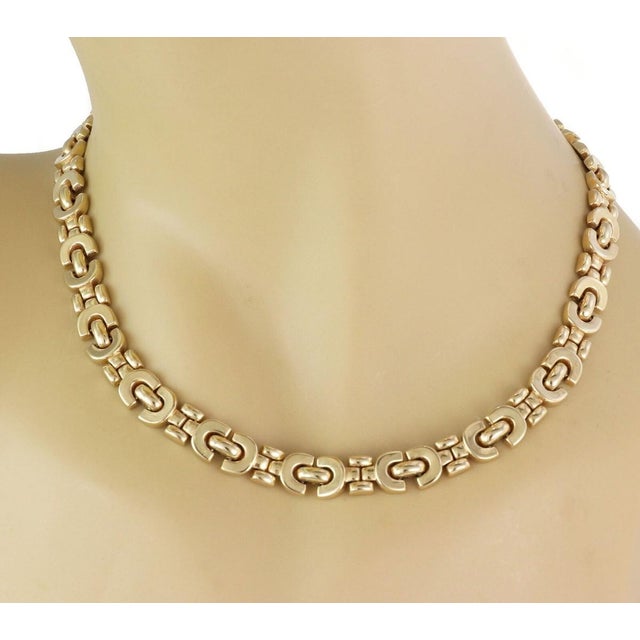 This Fancy 14k Yellow Gold Link Necklace is a vintage piece of fine jewelry. Crafted in original style, this choker...