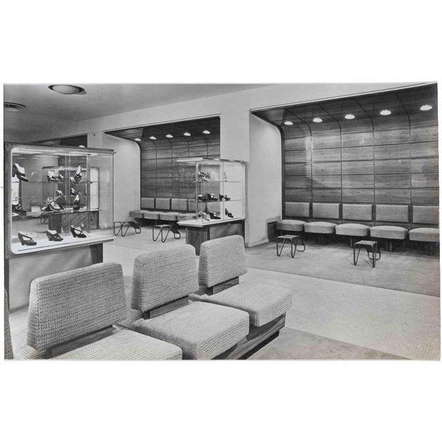 Vintage black and white photograph showing the interior of a fashion salon, most probably the NK Department Store...