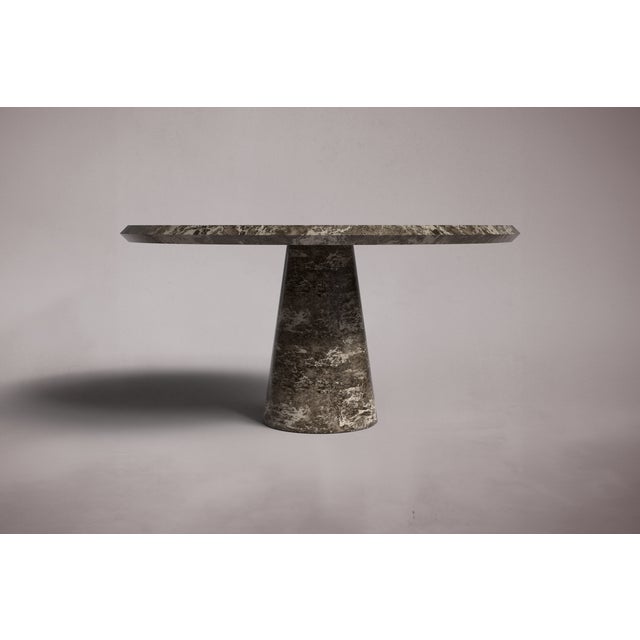 Crafted and hand-finished from solid blocks of Emperador Dark Marble, each piece exhibits the inherent variations in...