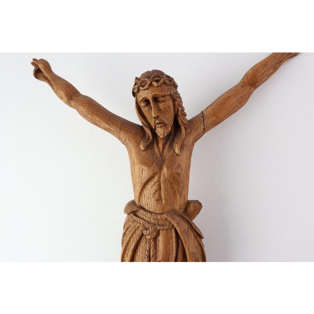 A moving and finely crafted example of late 19th‑century Italian devotional art, this sculpted oak crucifix captures both...