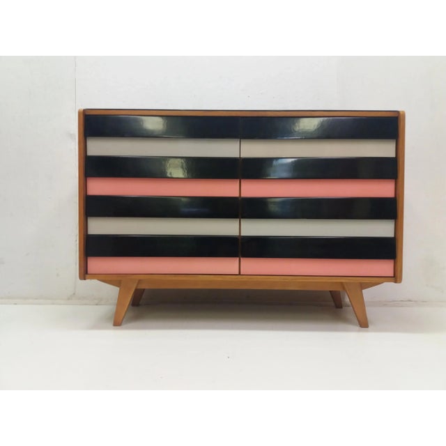 Good original condition Oak veneer with eight lacquered drawers. Design by Jirí Jiroutek 1958 produced by Fa Interiér...