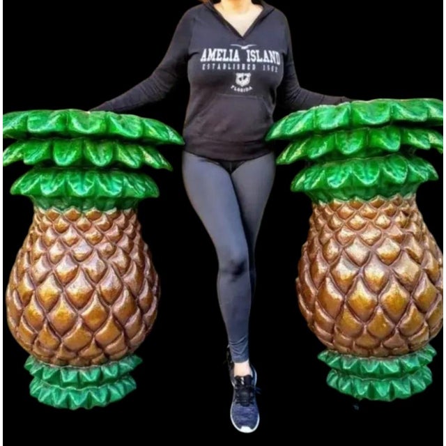 A pair of unbelievable monumental rare pineapple wall sconce lights. The sconces came out of a condemned hotel in Miami...