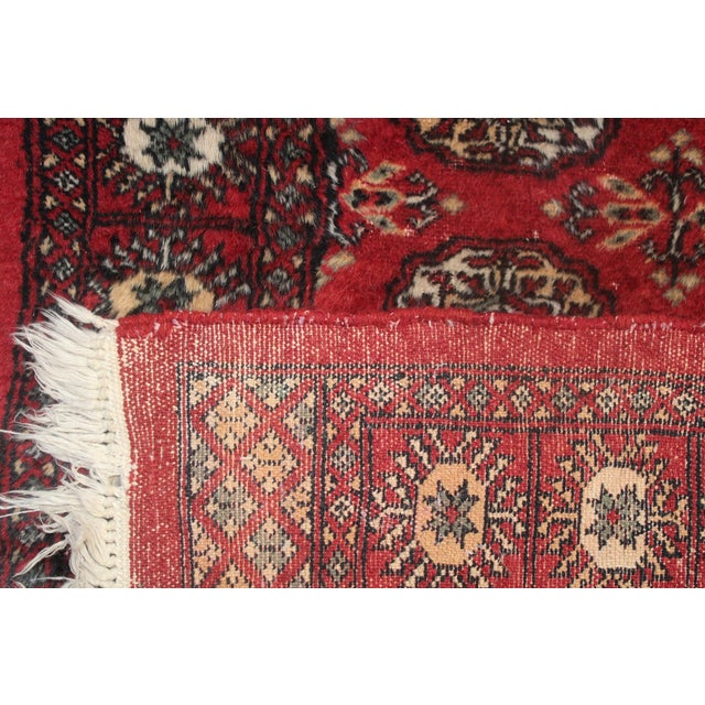 Red Vintage Hand-Knotted Wool Bokhara Runner Rug. 21'x 2'7