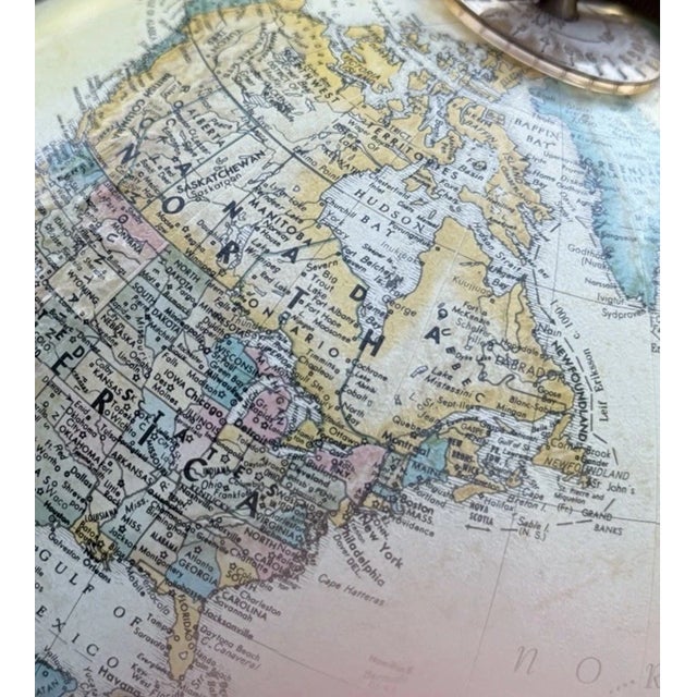 Enhance your home or office with this **Vintage Replogle 12" World Classic Desktop Globe**, a timeless blend of...