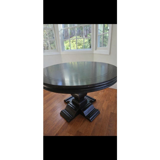 Ambella Furniture Round Dining Table This elegant round dining table by Ambella Furniture offers timeless design paired...