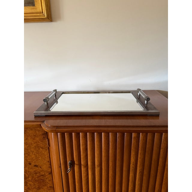 Modernist mirrored tray in the manner of Jacques Adnet France 1940 /1950 Lucite, metal, glass, wood H 7 cm 53 × 35 cm...