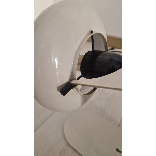 Hanging White Iron Table Lamp from Stilnovo, 1970s, in Very Good conditions. Designed 1970 to 1979 This piece has an...