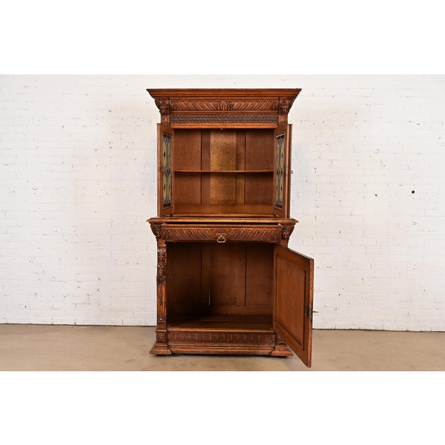 Late 19th Century Antique French Renaissance Revival Carved Oak Breakfront Bookcase or Bar Cabinet With Stained Leaded Glass Doors, Circa 1890s For Sale - Image 5 of 14