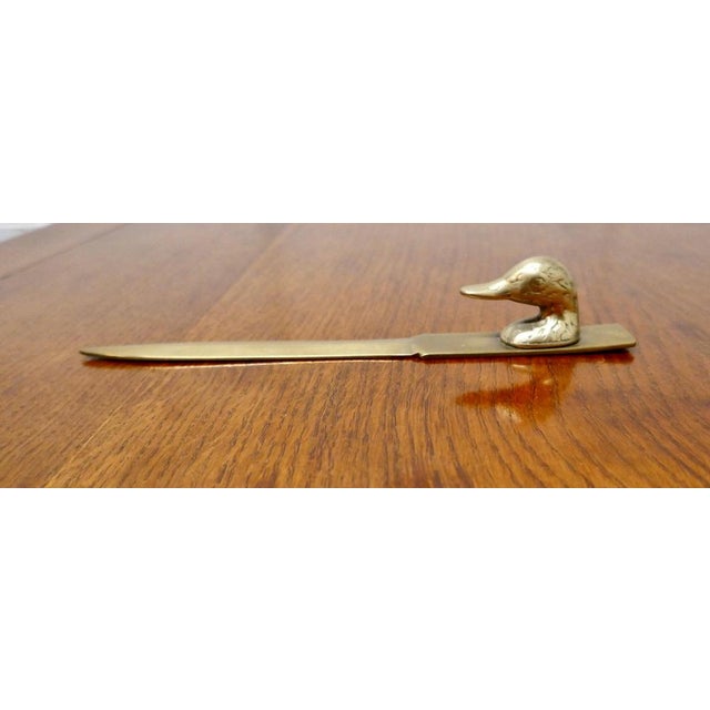 French brass duck’s head letter ppener, paper knife. A great desk piece, the knife sits neatly on your desk ready for use,...