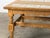 This oak coffee table is executed in the manner of Henning Kjærnulf, likely produced in Denmark during the 1960s. The...