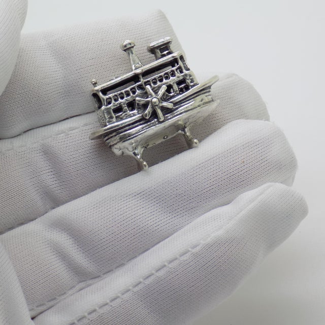 A charming vintage miniature depicting a paddlewheel steamboat, handmade in Continental Silver (800/000) in Arezzo between...