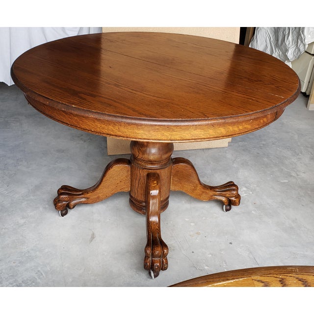 1930s MidCentury Modern Solid Oak Claw Foot Table on Casters Chairish
