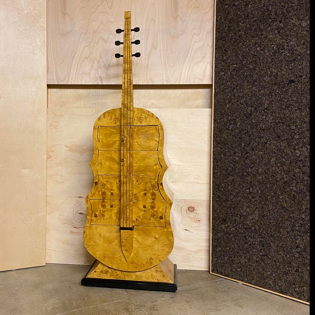 Remarkable Art Deco commode cabinet with drawers in burl maple wood with black painted details.