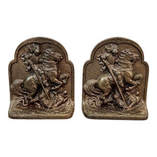 Antique 1925 Hubley #312 Cast Iron, Bronze-Clad Bookend in Bas-Relief Depicting the Legend of Saint George Slaying the Dragon For Sale