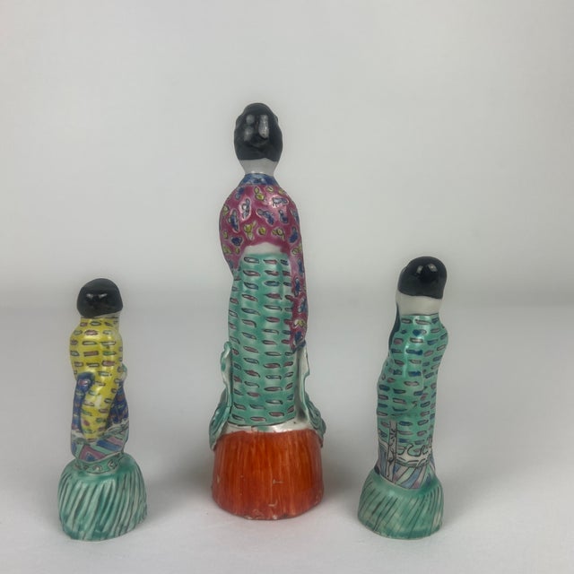 Wonderful little trio of famille rose porcelain figures. Intricately, hand-painted in vibrant colors. The measurement...