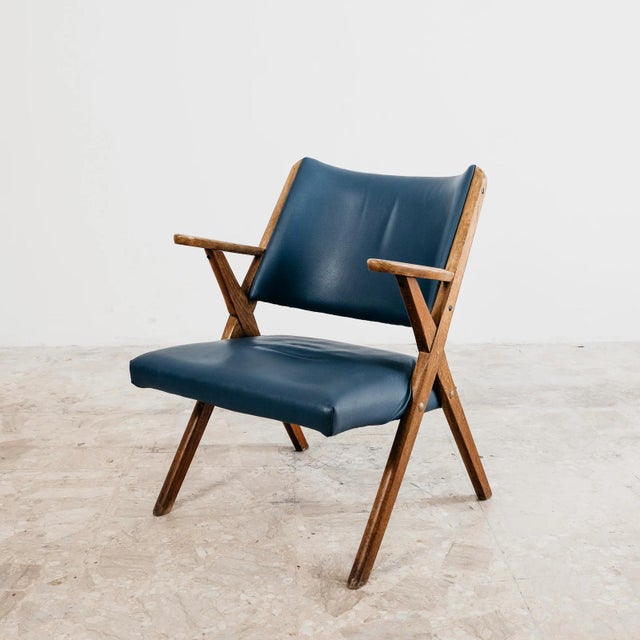 A stunning vintage lounge chair (lower lounge chair) produced by the historic Italian manufacturer Dal Vera of Conegliano...