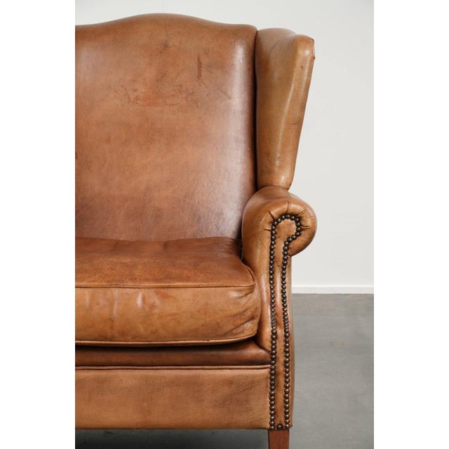 English Sheepskin Wing Armchair in Light Cognac Color For Sale - Image 9 of 13