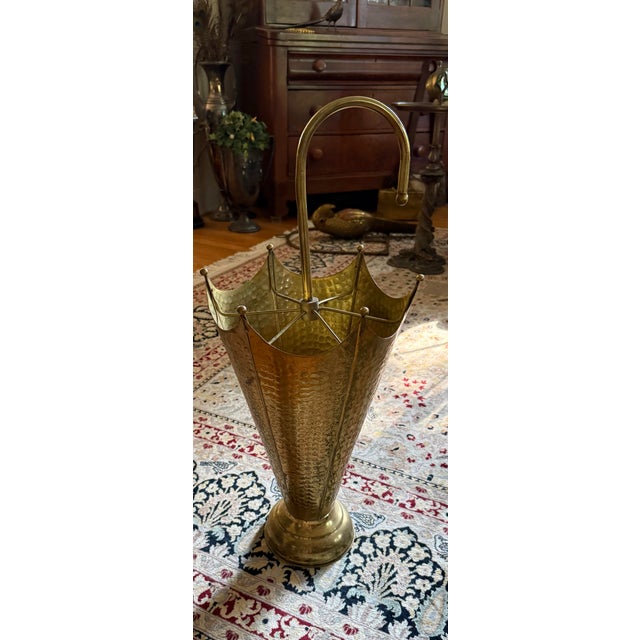 For sale is a sweet hammered vintage light weight brass unbrella stand that brighten up a room.