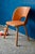 This small barrel chair for children is a charming retro piece from the 1960s. with its splayed legs and enveloping camel-...