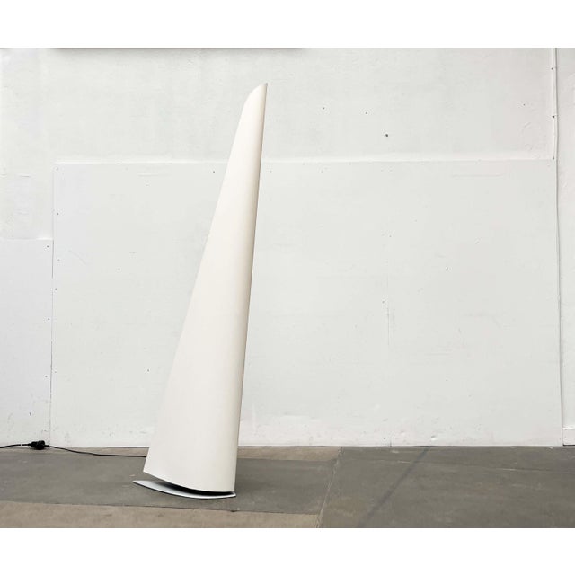 Postmodern floor lamp by Rolf Benz, designed by A. Engbert and F. Ringelhan in 1990. The design clearly draws its...