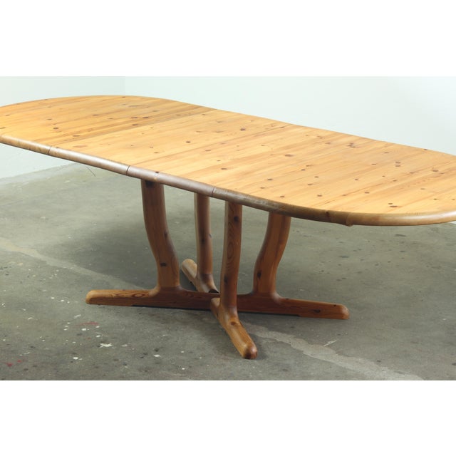 Large, beautiful solid pine dining table with extension. The table is crafted from thick pine wood, organically shaped...
