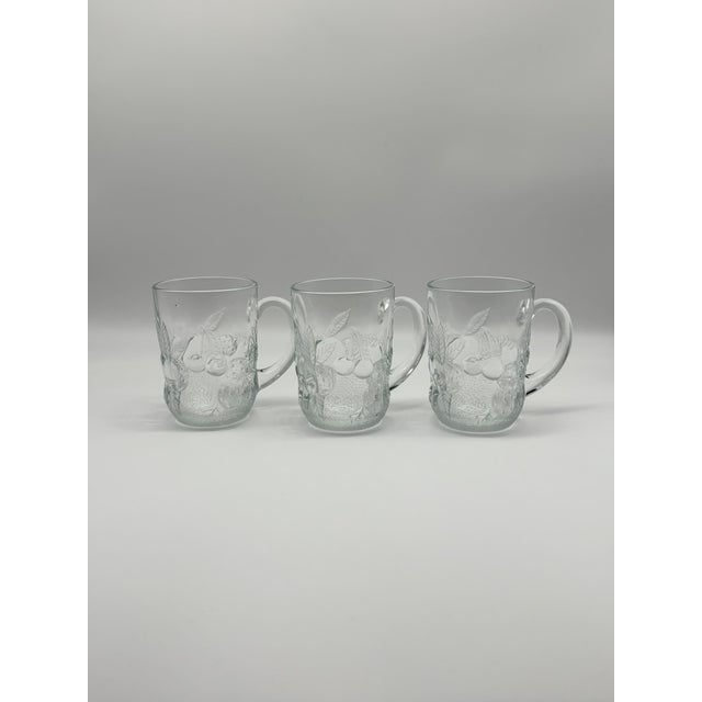 Great set of three vintage Arcoroc clear glass mugs features the Berry pattern, which is textured at the bottom and...