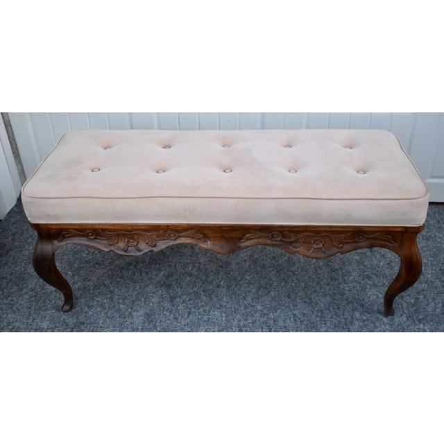 Vintage (1980's) Bench has a French Country Style. The Seat is Tufted with a Faux Suede Fabric. The Frame is Wood. Carved...