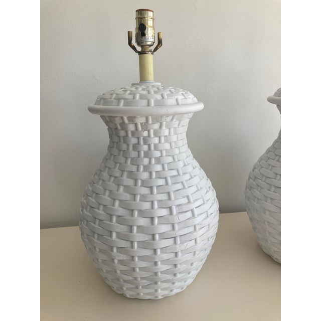 Wonderful pair of Plaster Faux Wicks Basket Table lamps in the Style of Serge Roche. Unusual to have a pair available in...