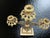 A beautiful antique brass girandole candelabra featuring an ornate basket-of-flowers motif set on a marble base. American...