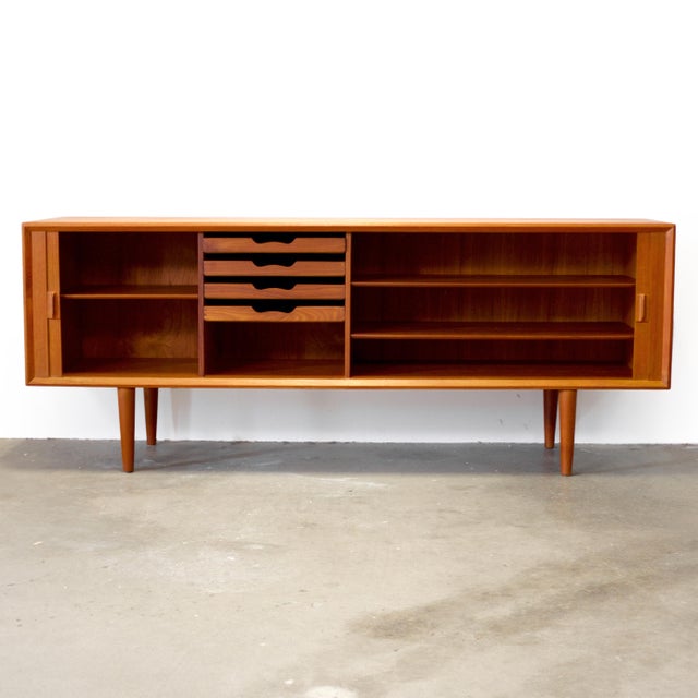 Dimensions: 79 1/2" L x 19 1/8" D x 31 1/2" H Origin: Faarup, Denmark Designer: Svend Aage Larsen Manufacturer: Faarup...