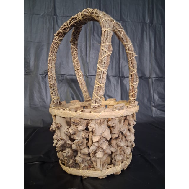 This rustic Adirondack style twig or bark foraging basket was commonly handmade in the Appalachian or Amish country...