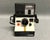 A fun and colorful rainbow stripe Polaroid One Step Land camera with flash. Enjoy this 1970s camera with instant...