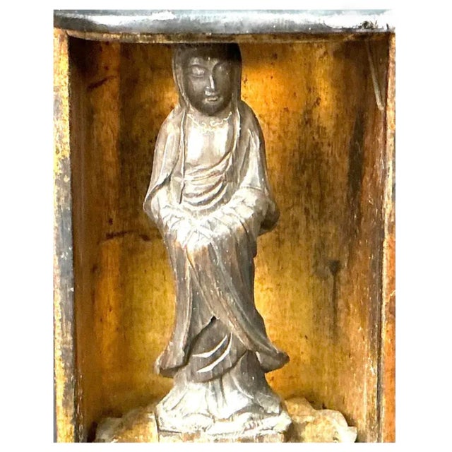 Finely crafted Japanese Zushi (portable Buddhist shrine) that features a delicately carved standing Buddhist figure housed...