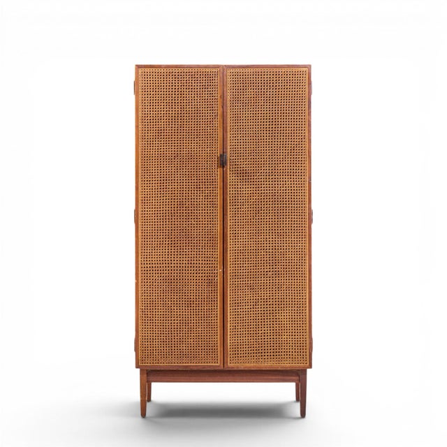 Kipp Stewart for Calvin Mid Century Walnut and Cane Front Cabinet Armoire This armoire measures: 25 wide x 17 deep x 50...