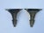 This pair of wall brackets is made of solid brass The classic style fits into many design styles There are spots of...