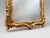 A wonderfully detailed French-style mirror with exceptional depth and intricate craftsmanship. Decorated with rich rococo...