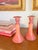 A very rare find! This pair of 1920s Tiffin #151 Candlesticks are made out of their Carrara Coral colorway, which was...