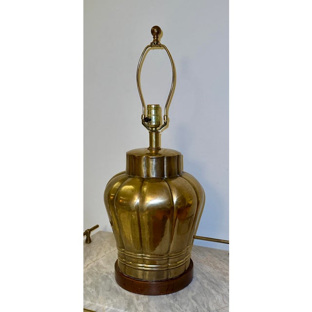 A gorgeous classic brass table lamp by acclaimed lamp maker, Frederick Cooper. With a fluted ginger jar silhouette and...