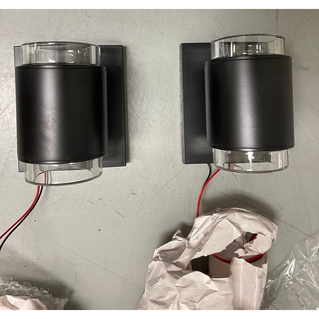 Illuminate your home with the sleek sophistication of the Voto 9W 1 LED Round Wall Sconce. Crafted for style and...